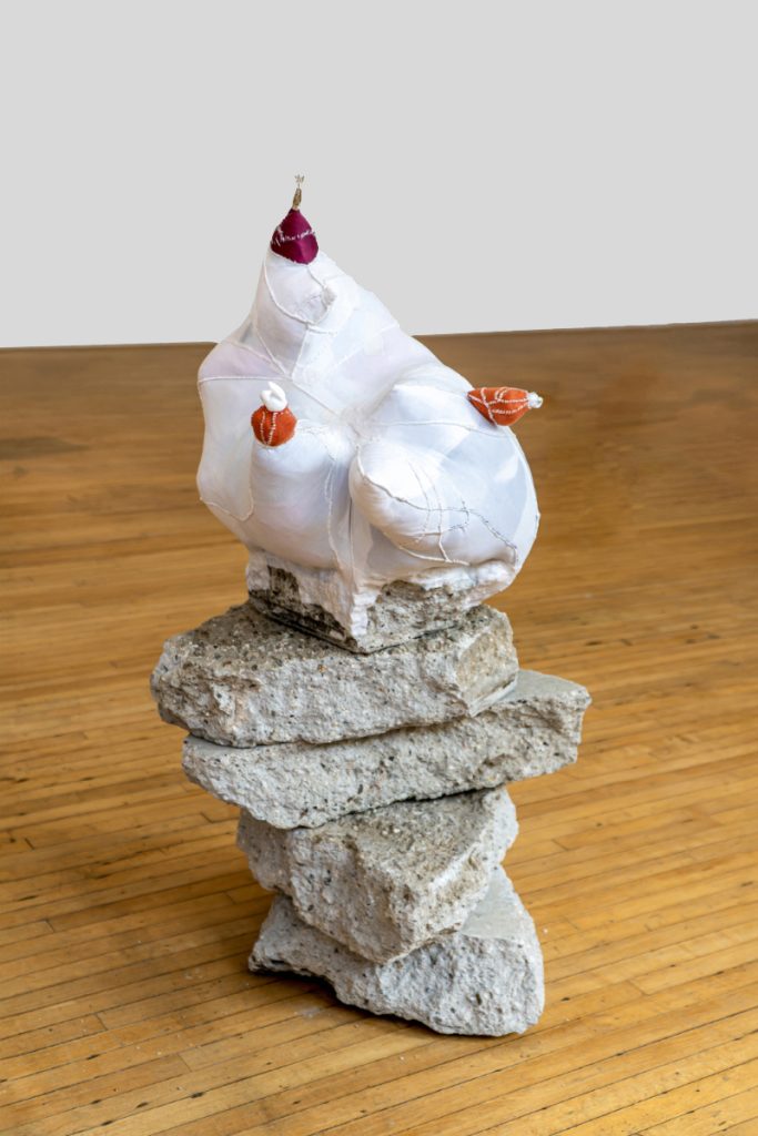 China Adams, Untitled, 2023, 10 freeway concrete, broken glass animals, artists’ scrap (material, clothing, rags), dental floss, 20 X 15.5 X 13.5 inches
